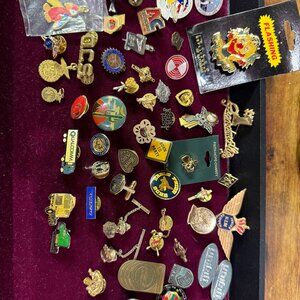 lot of different lapel pins